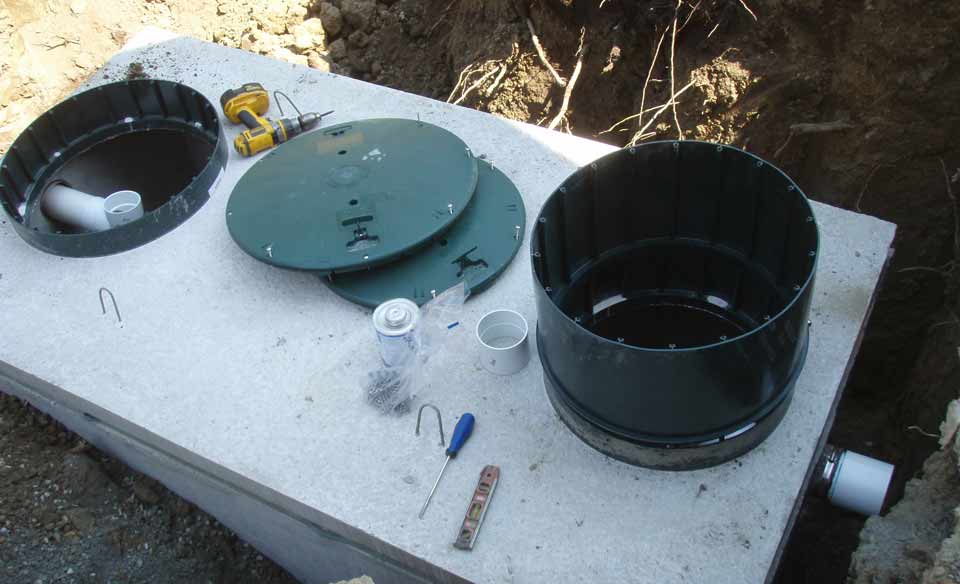 New septic tank riser installation